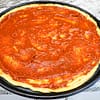 Oil-free Pizza Sauce spread on a pizza base