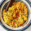 curry hummus served in a traditional bowl from Moroco