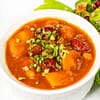 smoky butternut chili served in a white bowl