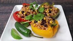 Vegan Stuffed Bell Peppers served on the white plate