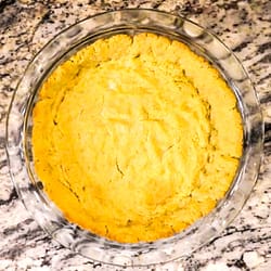 Garbanzo bean pie crust served in a glass bowl