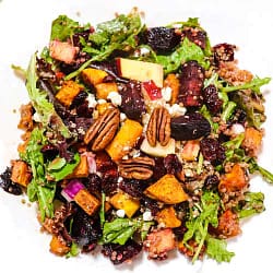 sweet potato beet salad assembled in an overhead shot