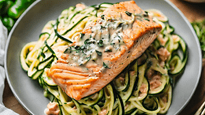 creamy tuscan salmon over zucchini noodles