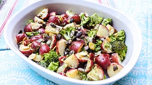 Vegan Red Potato Broccoli Salad served in a white bowl
