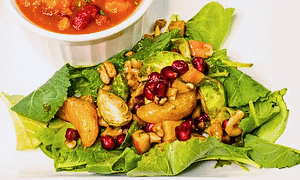 salad served on a white plate