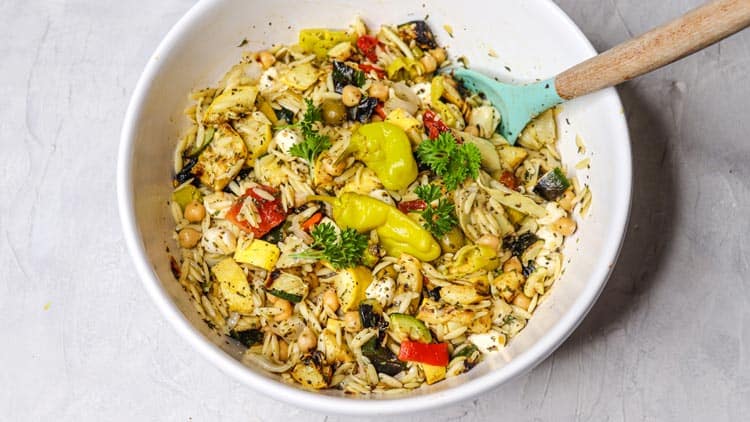 Grilled veggie antipasta salad served in a white bowl