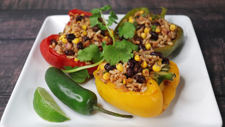 Vegan Stuffed Bell Peppers served on the white plate