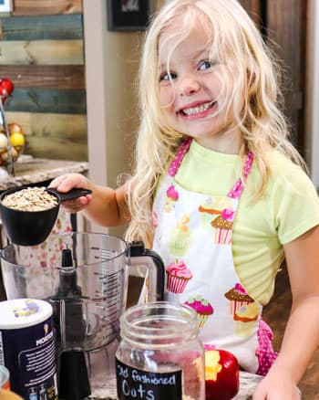 Caitlin's daughter helping with making the Pumpkin Pie Oatmeal Cookies