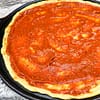 Oil-free Pizza Sauce spread on a pizza base