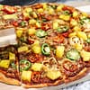 Garbanzo (chickpea) flour crispy thin pizza crust with peppers and pineapple