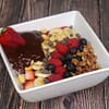 Whipped Coffee Chocolate Bowl with Coconut Milk and blueberries, strawberries, banana and raspberries on the top