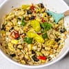 Grilled veggie antipasta salad served in a white bowl