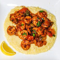 Healthy Shrimp and Grits served on a white plate