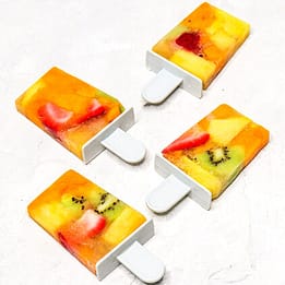 homemade electrolyte popsicles with tropical fruits