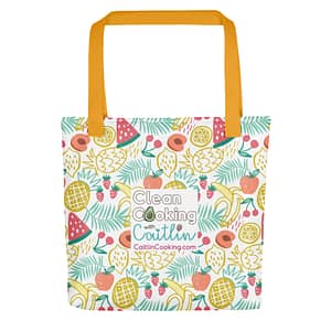 Shopping bag with colorful fruit and logo, and orange handles