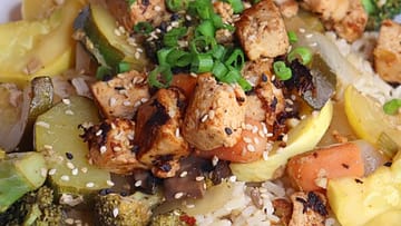 White plate with Asian tofu stir fry
