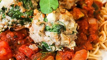 spinach turkey meatballs on top of spaghetti