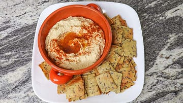 quinoa flaxseed crackers with hummus
