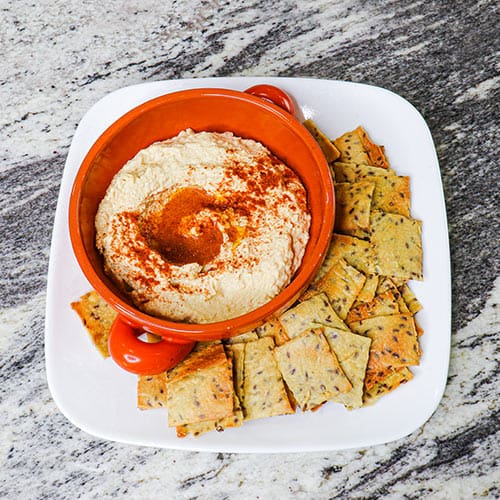 quinoa flaxseed crackers with heavenly hummus