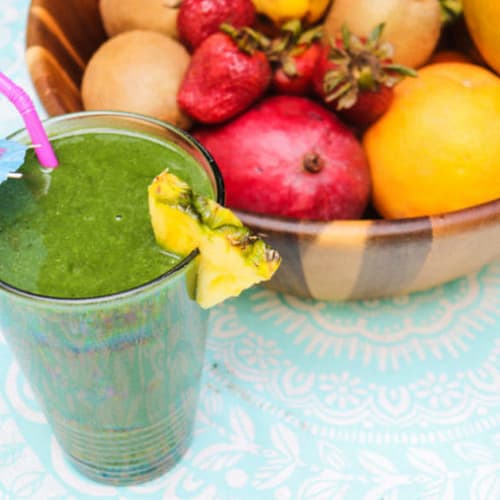 Tropical Spirulina Smoothie with fresh tropical fruits in the bucket 
