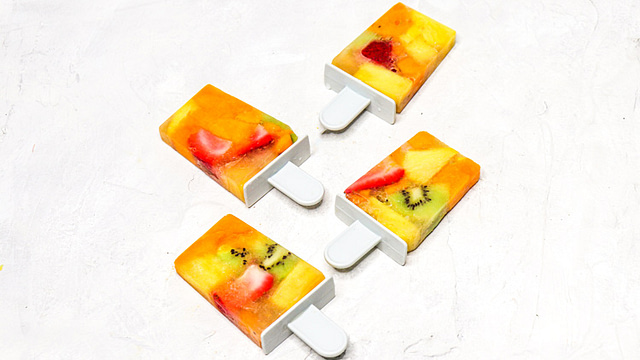 homemade electrolyte popsicles with tropical fruits