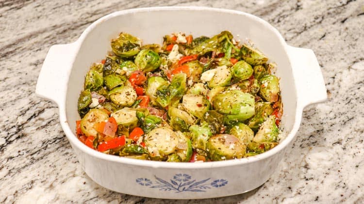 Mediterranean Brussel Sprouts served in a white baking pot