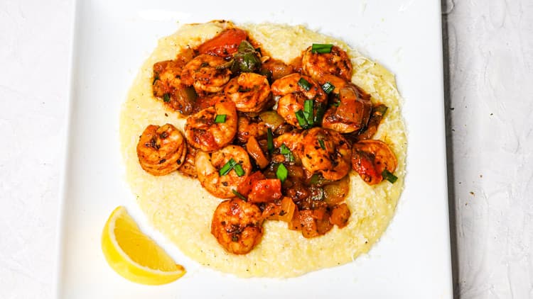 Healthy Shrimp and Grits served on a white plate