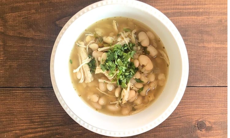 white bowl full of white chicken chili